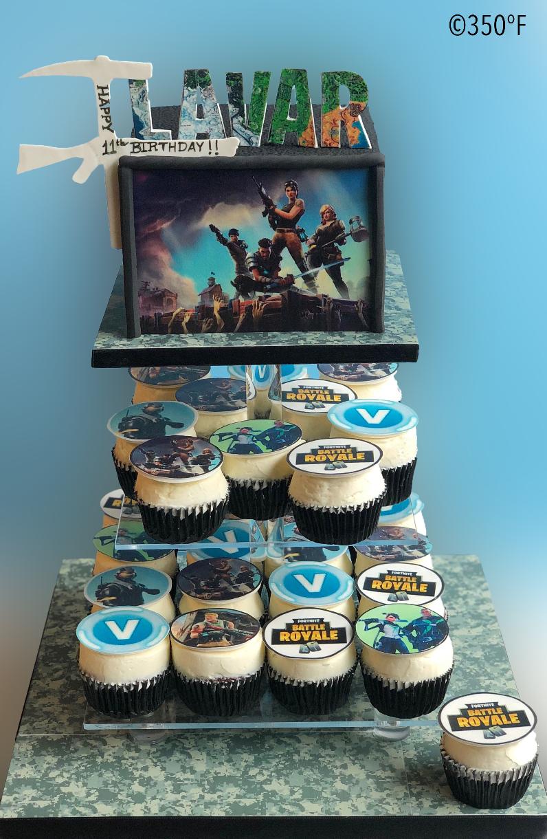 Fortnite themed birthday dessert tower with cake and cupcakes