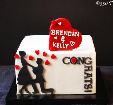A custom engagement cake for love birds