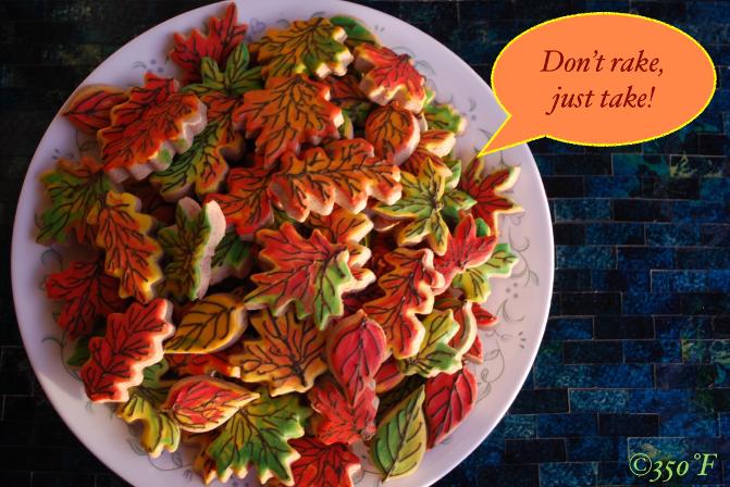 Heap of fall leaves that taste delicious! These custom decorated cookies are colorful and make the perfect treat for your Thanksgiving party guests