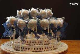 Silver cake pops as birthday party favors for a pinball themed kid's party