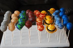 Planet cake pops for an astronomy themed baby shower, also perfect for a science themed children's birthday party
