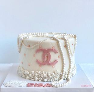 a chanel cake with pearls