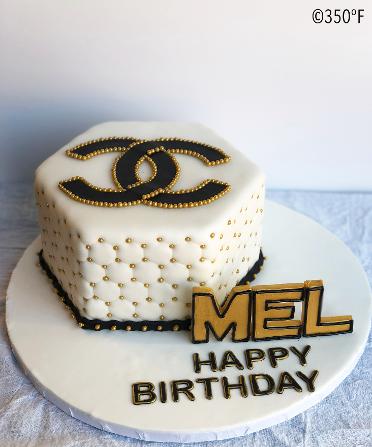 Coco Chanel themed Diva cake in white, black and gold with custom edible name accent