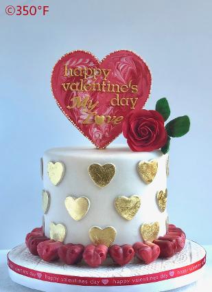 Valentine's Day cake with cookie topper and chocolate truffles decor