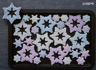 Snowflake cookies set in white, blue and lavender for the holiday season