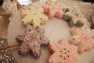 Snowflake rice krispie pops adorn a Winter Wonderland dessert table
