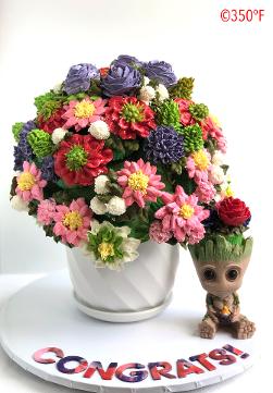 Baby shower cupcake bouquet with Groot's figurine