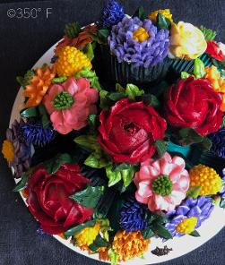 a cupcake bouquet created as a retirement gift with buttercream flowers