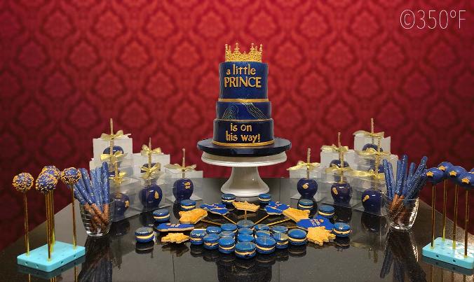 A royal themed baby shower dessert table
