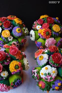 Floral cupcake bouquets as centerpieces for guest dinner tables