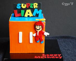 super mario themed cake with power ups for a 7th birthday party