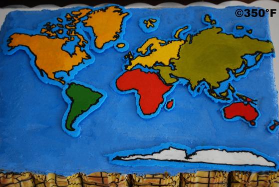 a cupcake platter with hand-piped world map for international day celebrations at school
