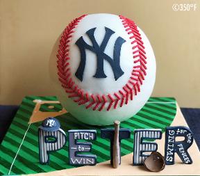 NY Yankees themed birthday cake - a 3D sculpted cake in the form of a baseball.