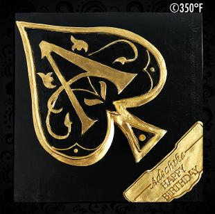 armand de brigade's ace of spades champagne logo is the inspiration behind this cake design.