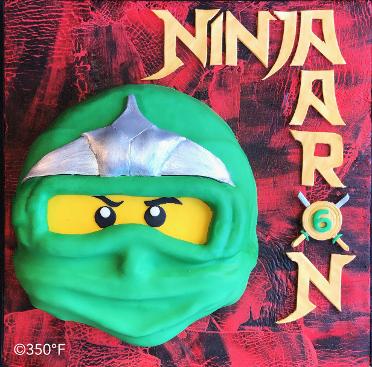 Green ninja lego head custom cake in Queens, NY
