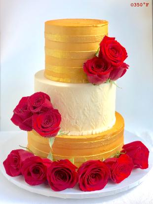 25th wedding anniversary cake in white, gold and red