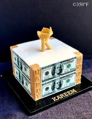 Square cake with 100 dollar bills and gold 