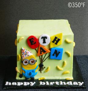 Minion Dave on Ethan's 7th birthday cake with bananas raining.